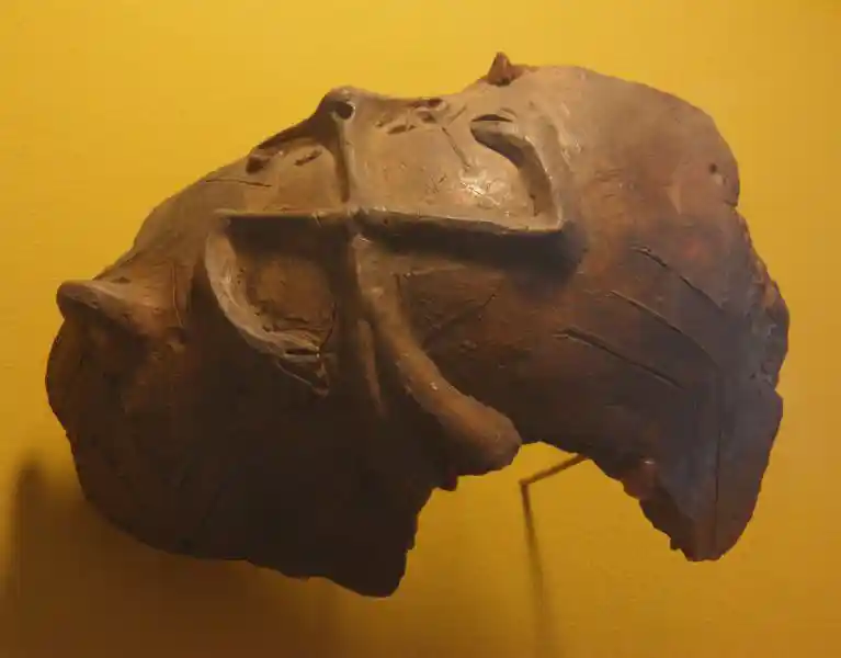 Man in the form of a rounded swastika